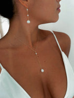 collier éclat d'ivoire porté vue d'ensemble